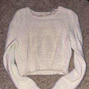 Cozy white top fashionable and perfect for every outing